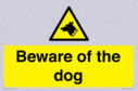 beware-of-the-dog-with-dog-warning-symbol~